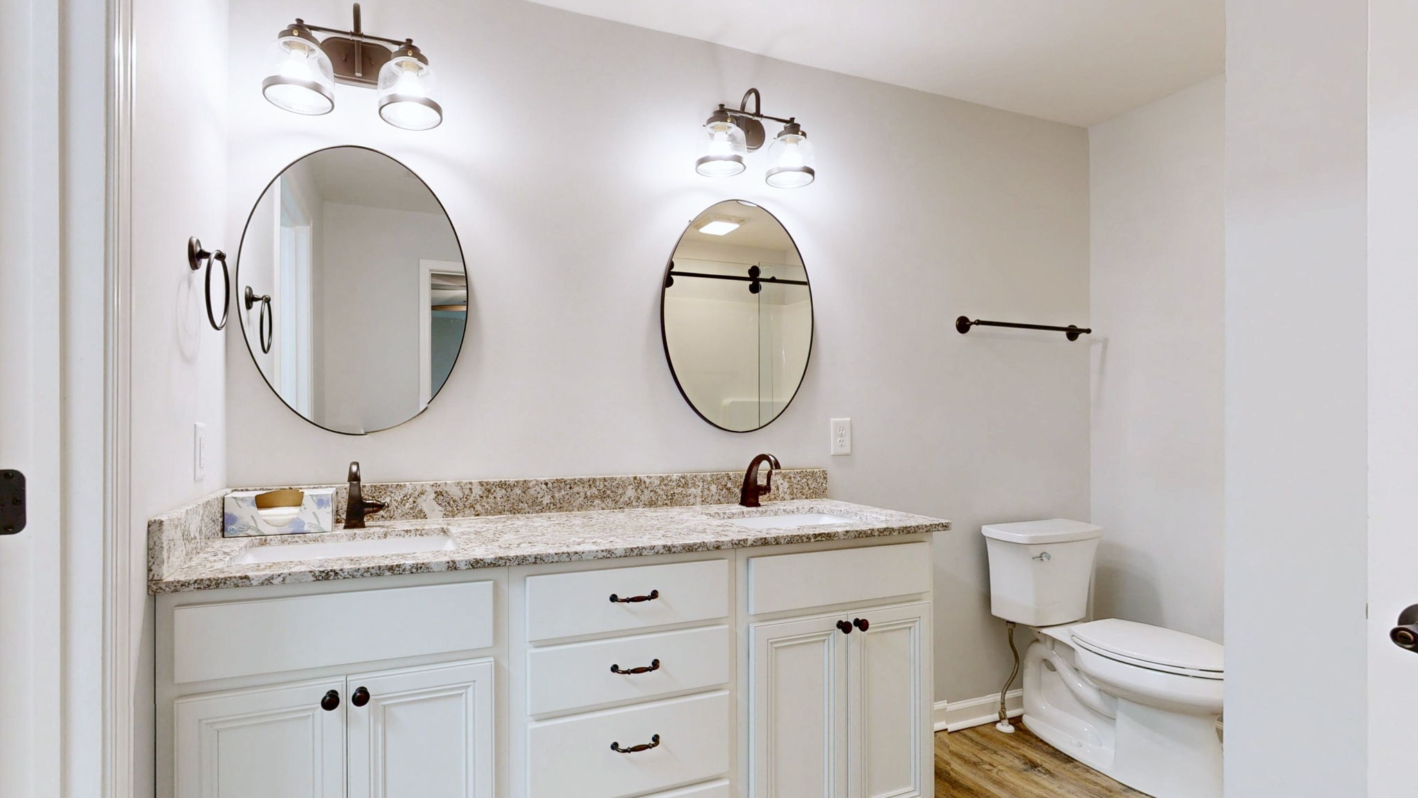 7563 South Swift Road Goodlettsville, TN 37072 - Photo 12 of 25 a bathroom with 2 sink and a mirror