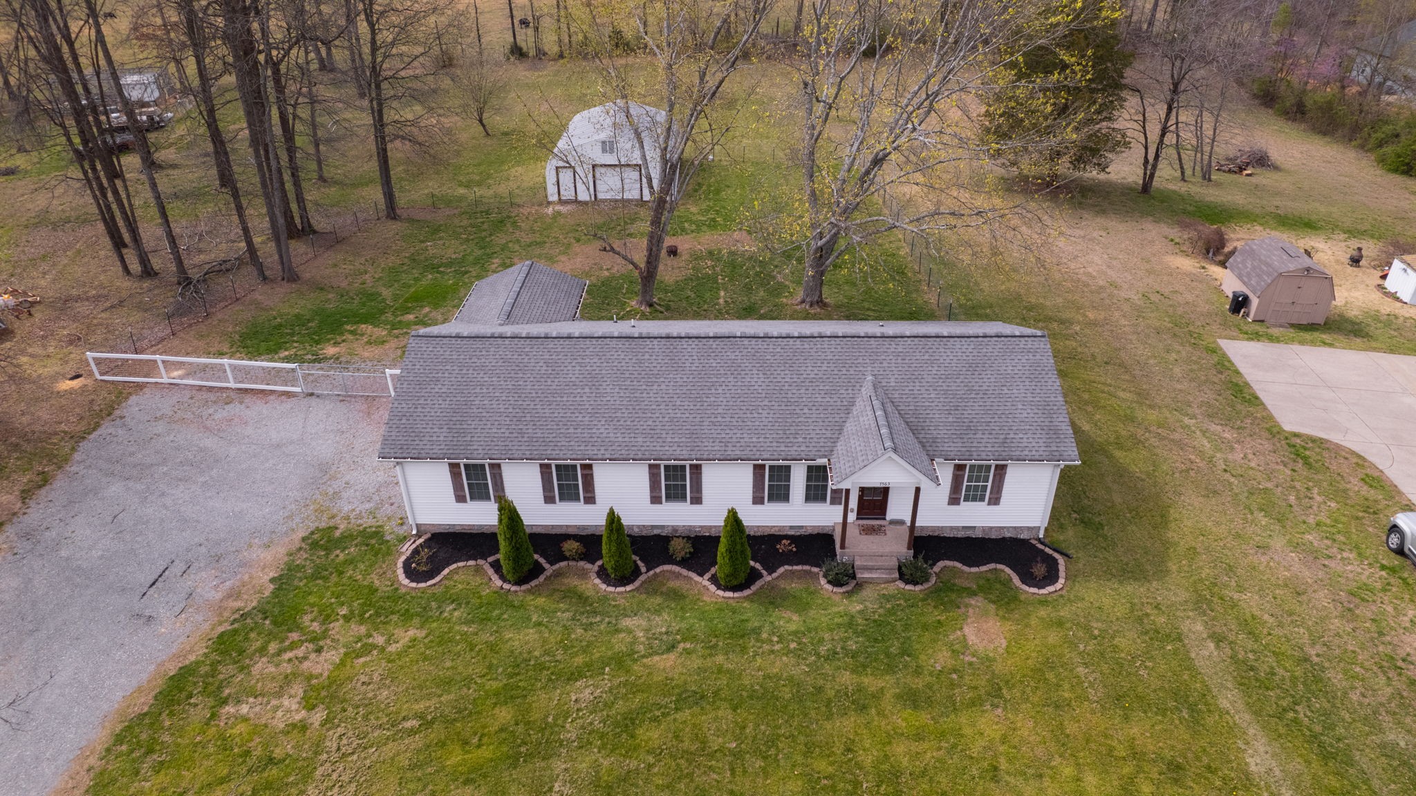 7563 South Swift Road Goodlettsville, TN 37072 - Photo 24 of 25 a aerial view of a house with table and chairs