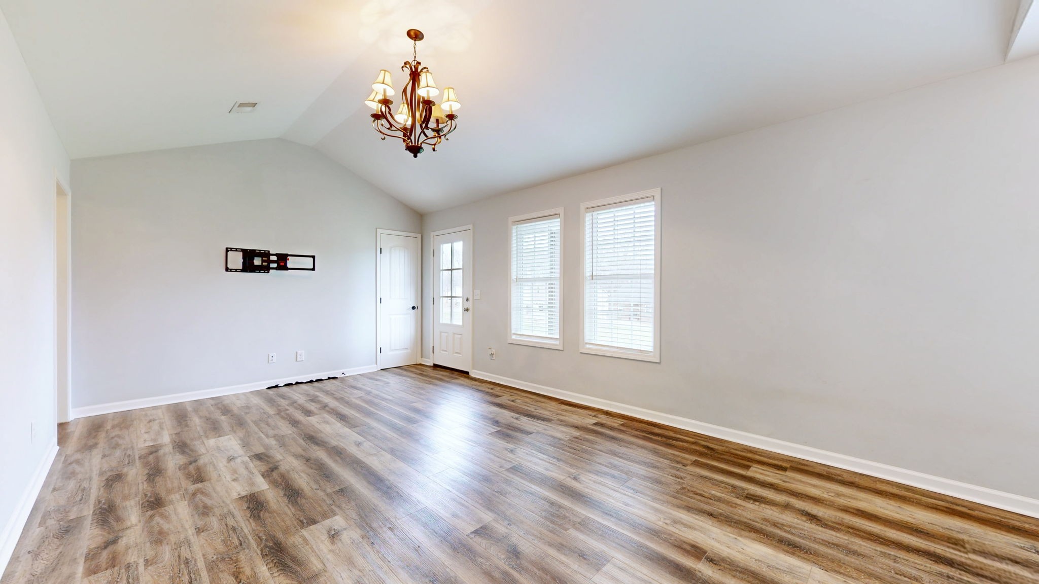 7563 South Swift Road Goodlettsville, TN 37072 - Photo 3 of 25 wooden floor in an empty room with a window