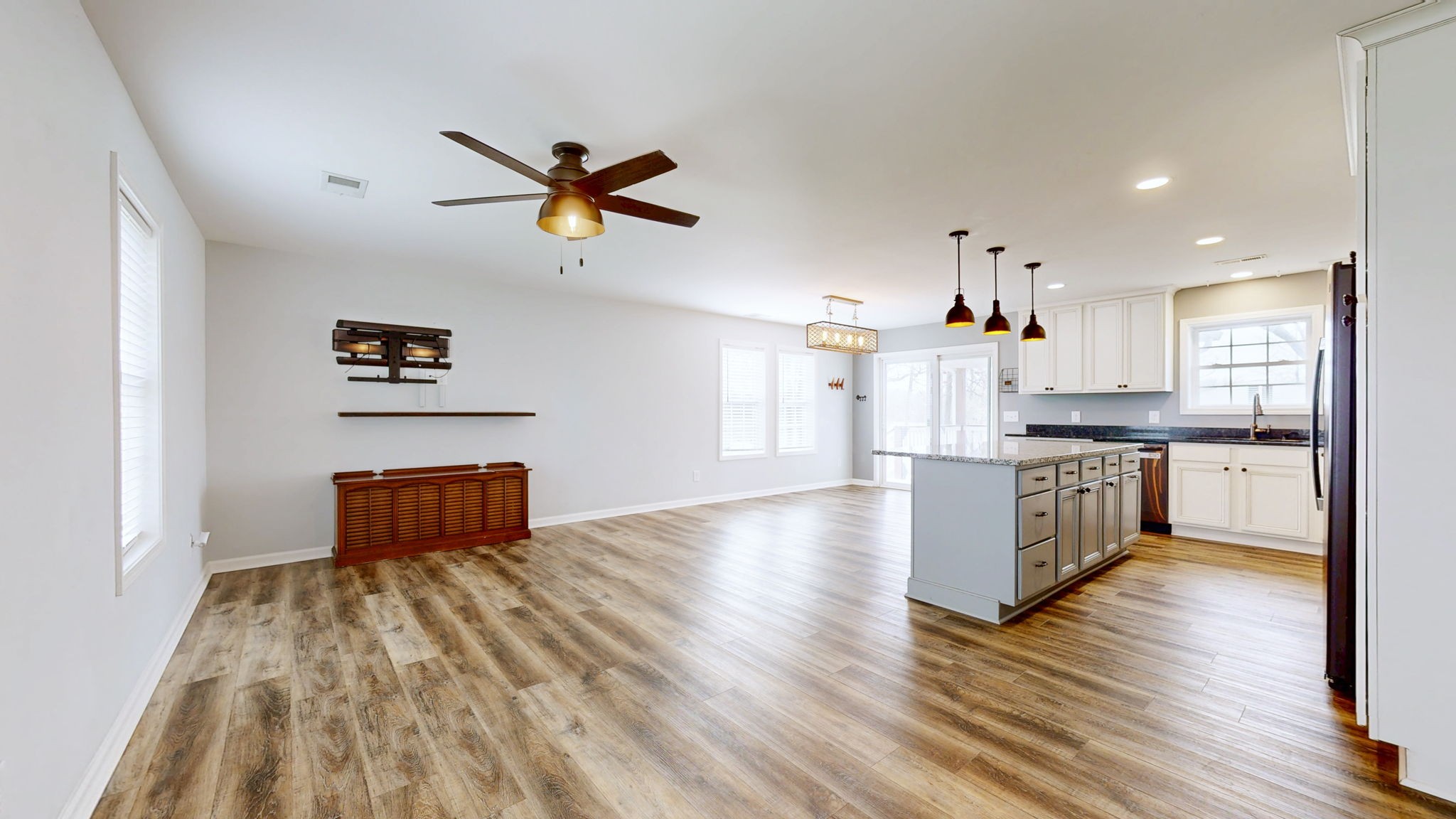 7563 South Swift Road Goodlettsville, TN 37072 - Photo 4 of 25 a kitchen with kitchen island white cabinets and stainless steel appliances