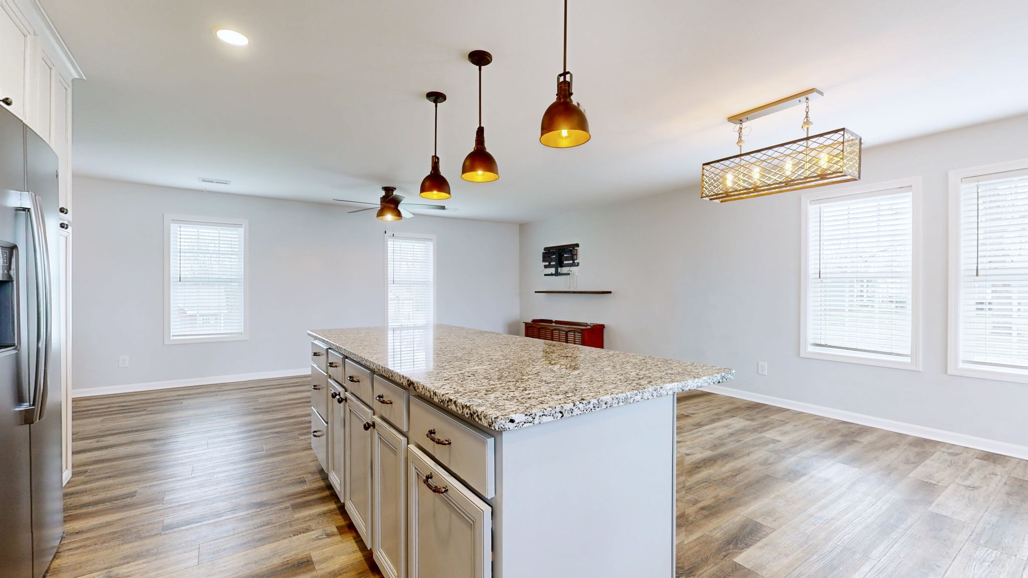 7563 South Swift Road Goodlettsville, TN 37072 - Photo 6 of 25 a kitchen with a sink a stove and wooden floor