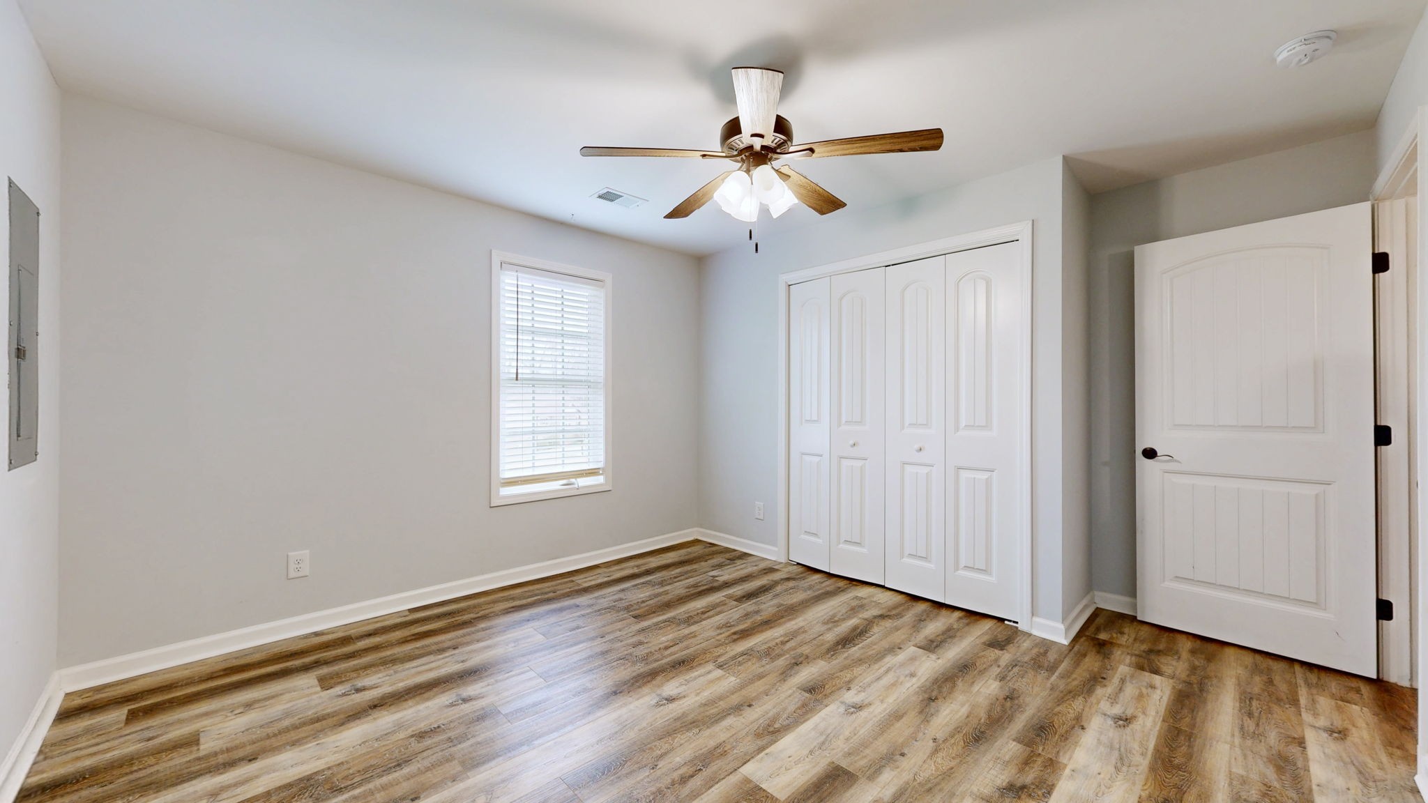 7563 South Swift Road Goodlettsville, TN 37072 - Photo 7 of 25 wooden floor in an empty room with a window