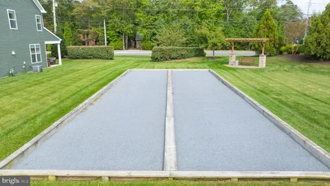 a bed room with furniture and wooden floor