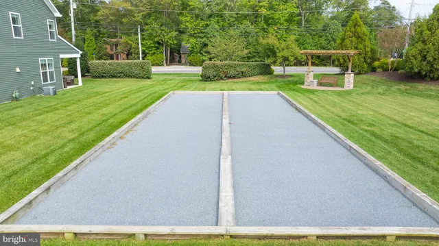 a bed room with furniture and wooden floor