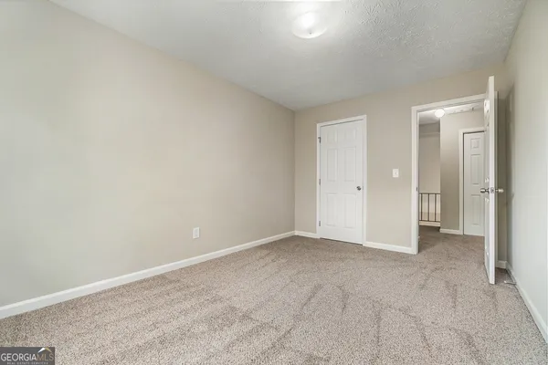 an empty room with an entryway