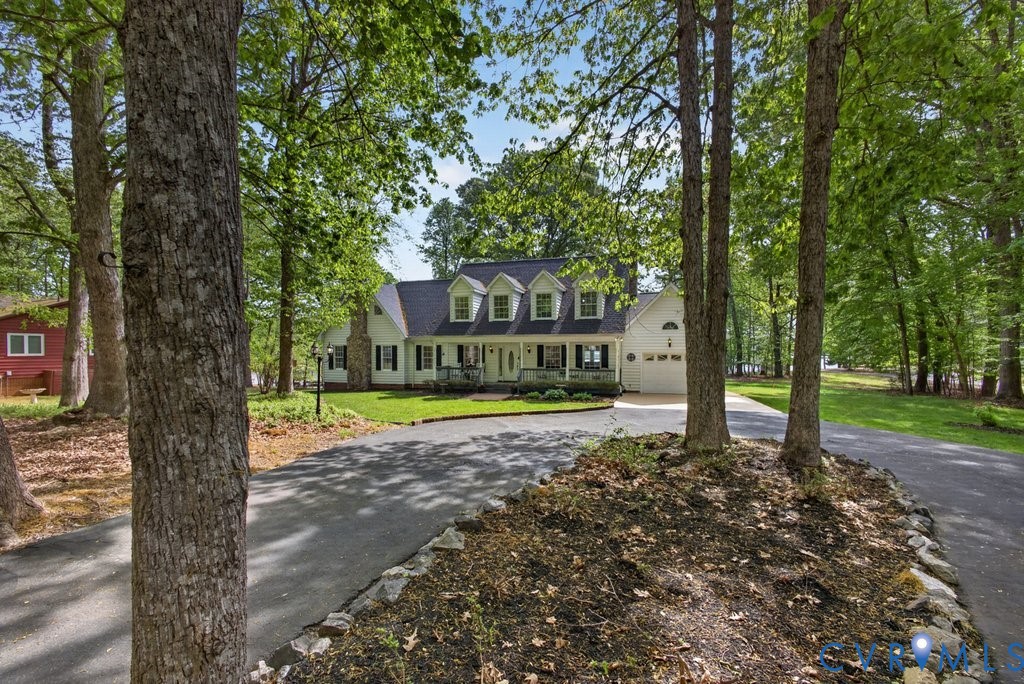 173 Covenant Way Bumpass, VA 23024 - Photo 3 of 63 The property features a traditional facade with do