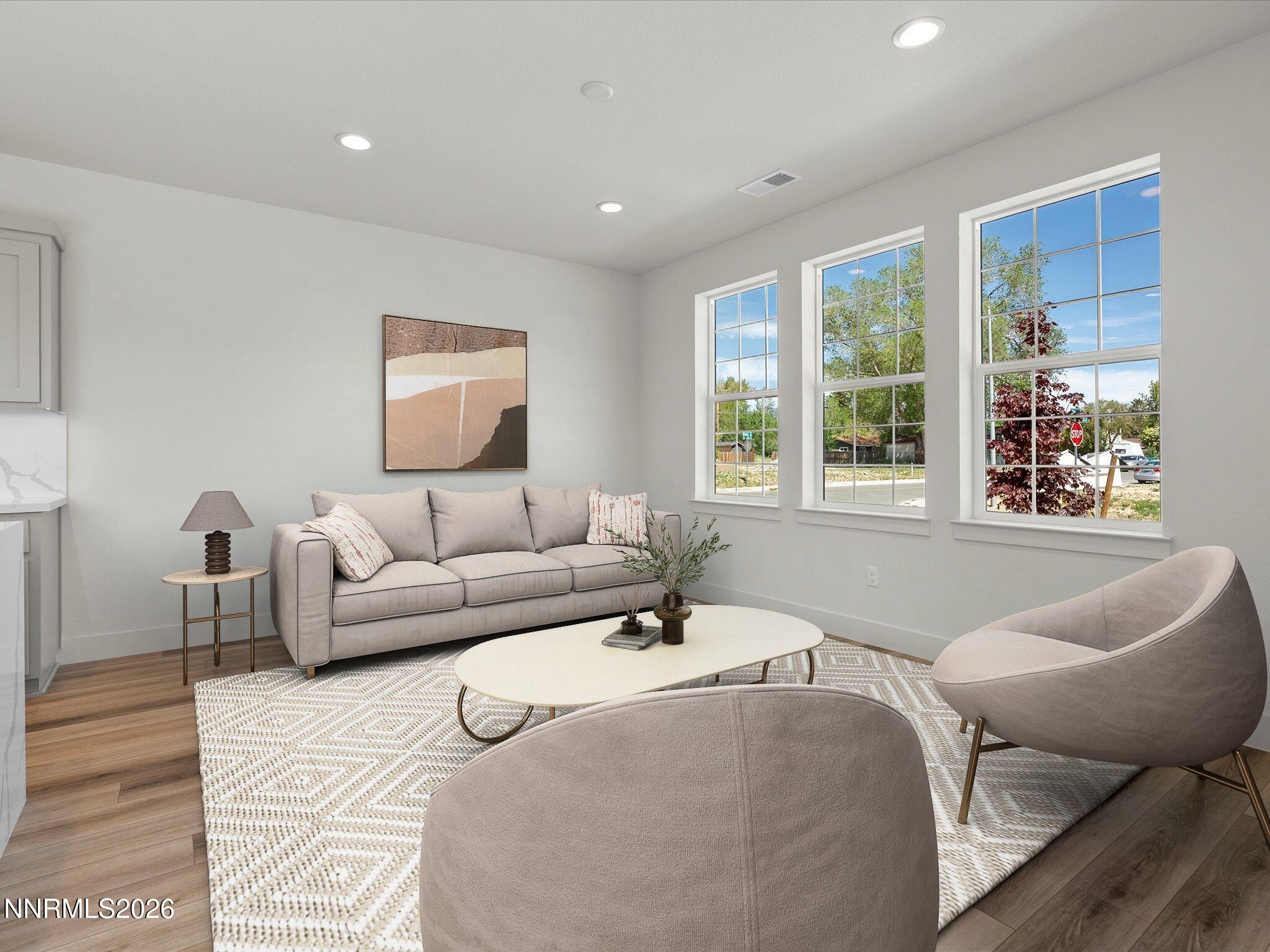 1383 Vine Gate Road, Unit HOMESITE 51 Carson City, NV 89701 - Photo 7 of 20 a living room with furniture and windows