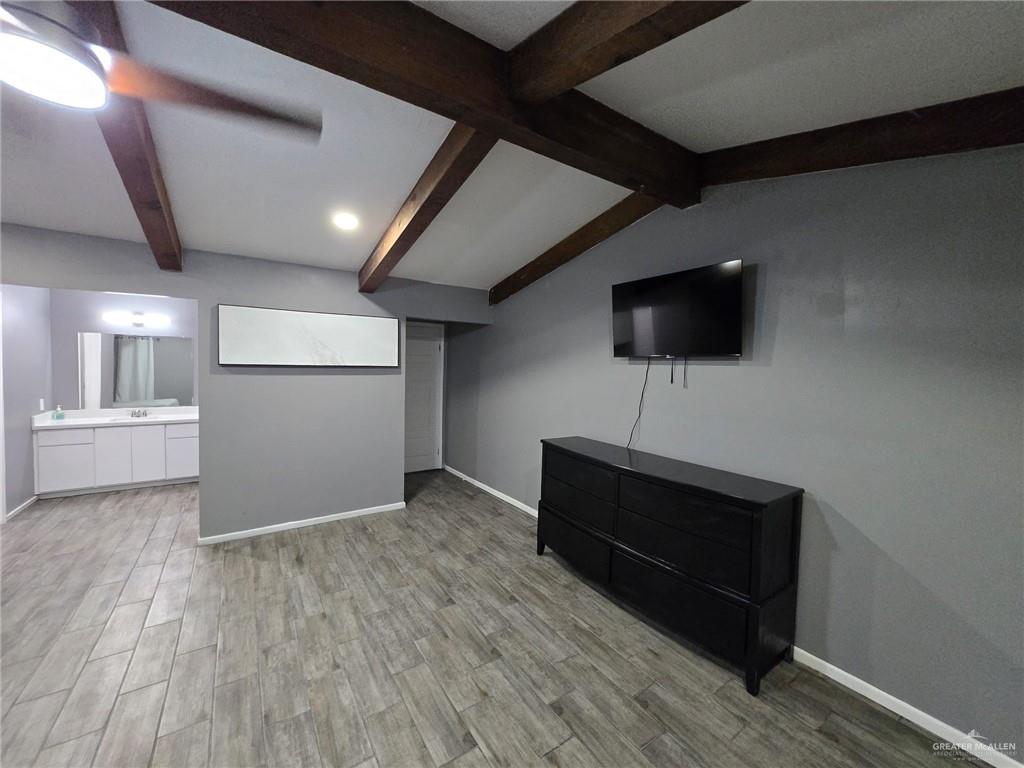 800 East Tulipan Avenue Hidalgo, TX 78557 - Photo 10 of 12 a living room with furniture and a flat screen tv
