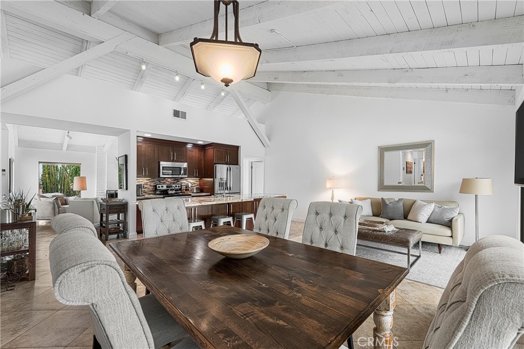 73425 Haystack Road Palm Desert, CA 92260 - Photo 11 of 30 a living room with furniture and a table