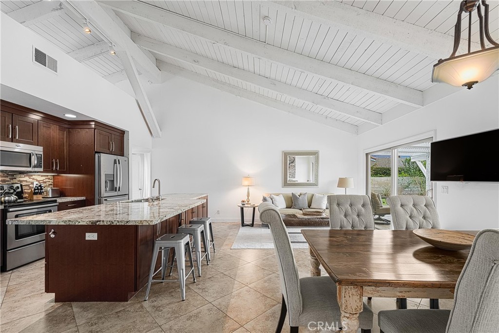 73425 Haystack Road Palm Desert, CA 92260 - Photo 13 of 30 a view of a dining room with furniture
