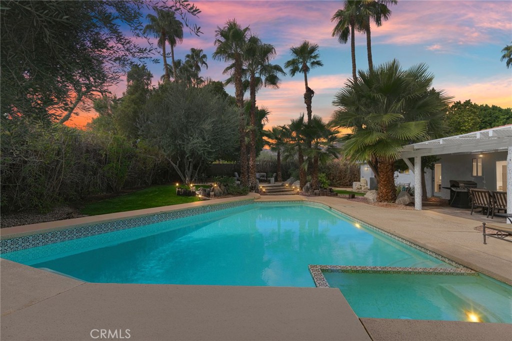 73425 Haystack Road Palm Desert, CA 92260 - Photo 2 of 30 a view of pool with palm trees
