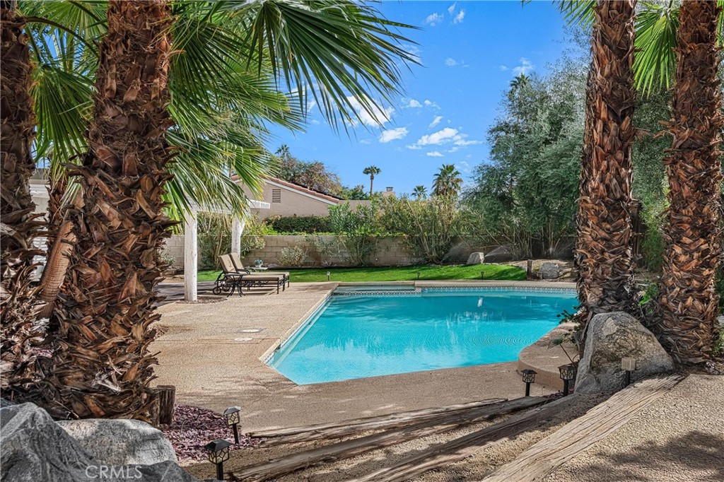 73425 Haystack Road Palm Desert, CA 92260 - Photo 21 of 30 a view of a yard with swimming pool
