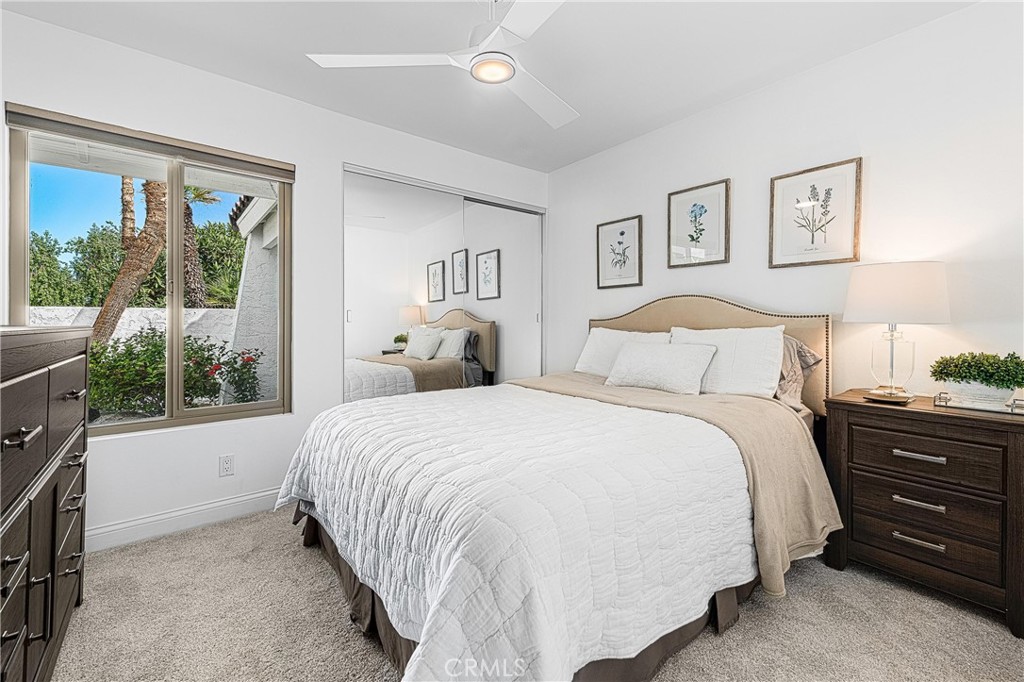 73425 Haystack Road Palm Desert, CA 92260 - Photo 30 of 30 a bedroom with a large bed and a window