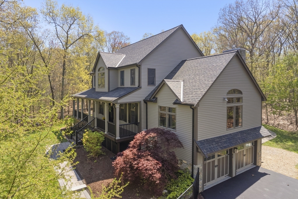 52 Fales Road Plainville, MA 02762 - Photo 2 of 41 a front view of a house with a yard and potted plants