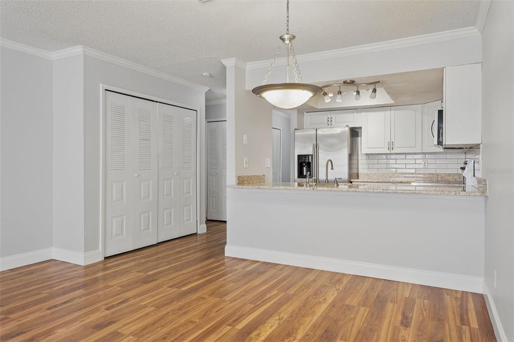 10307 Councils Way Temple Terrace, FL 33617 - Photo 15 of 50 a view of a room with wooden floor and staircase