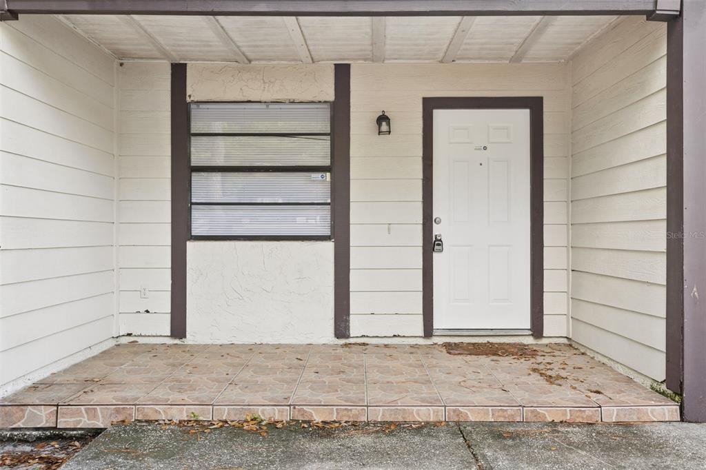 10307 Councils Way Temple Terrace, FL 33617 - Photo 2 of 50 a view of front door of house