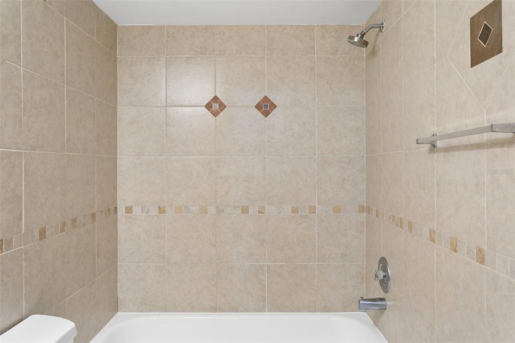 10307 Councils Way Temple Terrace, FL 33617 - Photo 28 of 50 a bathroom with a shower and toilet