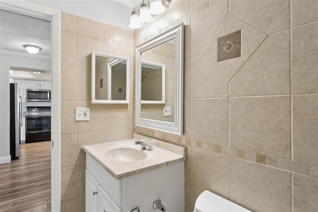 10307 Councils Way Temple Terrace, FL 33617 - Photo 29 of 50 a bathroom with a sink toilet and shower