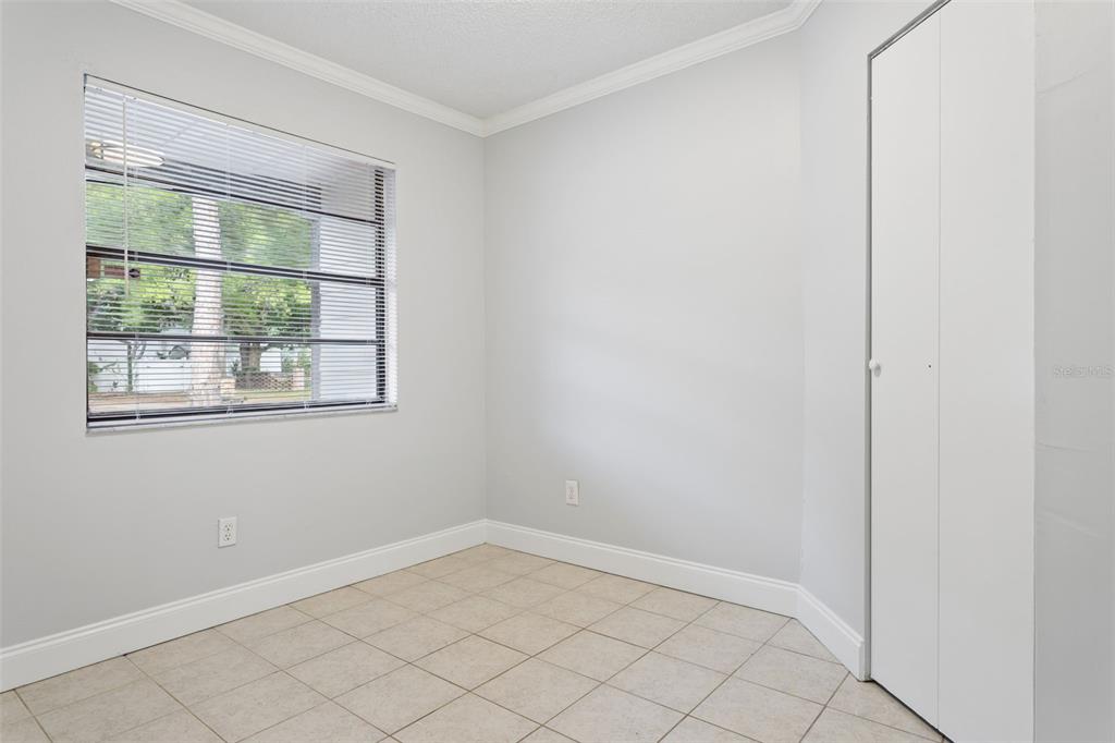 10307 Councils Way Temple Terrace, FL 33617 - Photo 30 of 50 a view of empty room with window