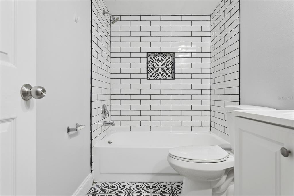 10307 Councils Way Temple Terrace, FL 33617 - Photo 38 of 50 a bathroom with a toilet and a shower
