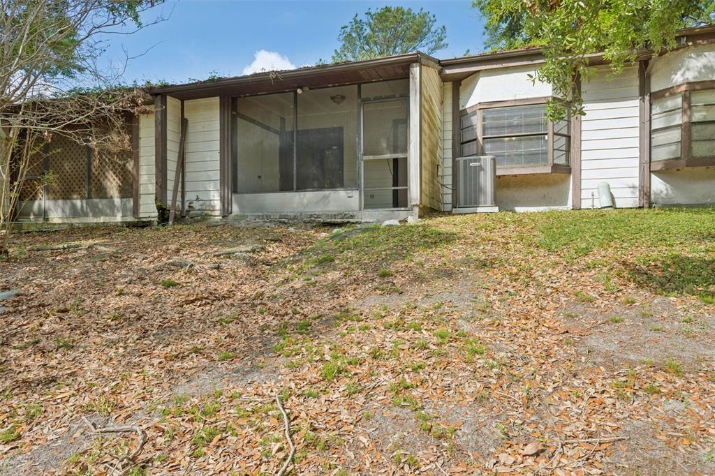10307 Councils Way Temple Terrace, FL 33617 - Photo 45 of 50 front view of a house with a yard
