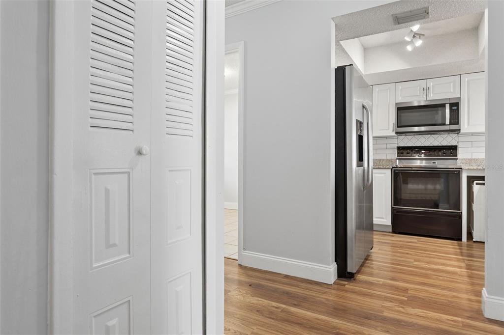 10307 Councils Way Temple Terrace, FL 33617 - Photo 7 of 50 a view of a kitchen from the hallway