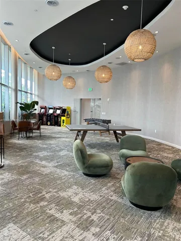 a view of a balcony with a floor to ceiling window