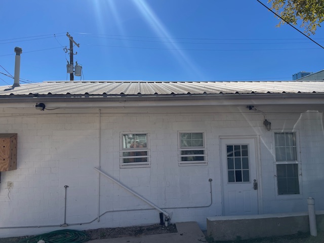 1105 East 6th Street Austin, TX 78702 - Photo 2 of 9 a view of a kitchen with granite countertop a sink and dishwasher