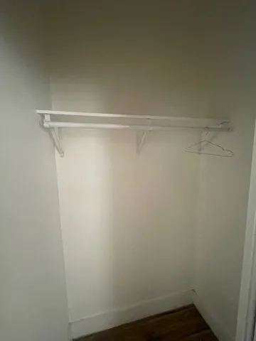 a view of small space with racks on the wall