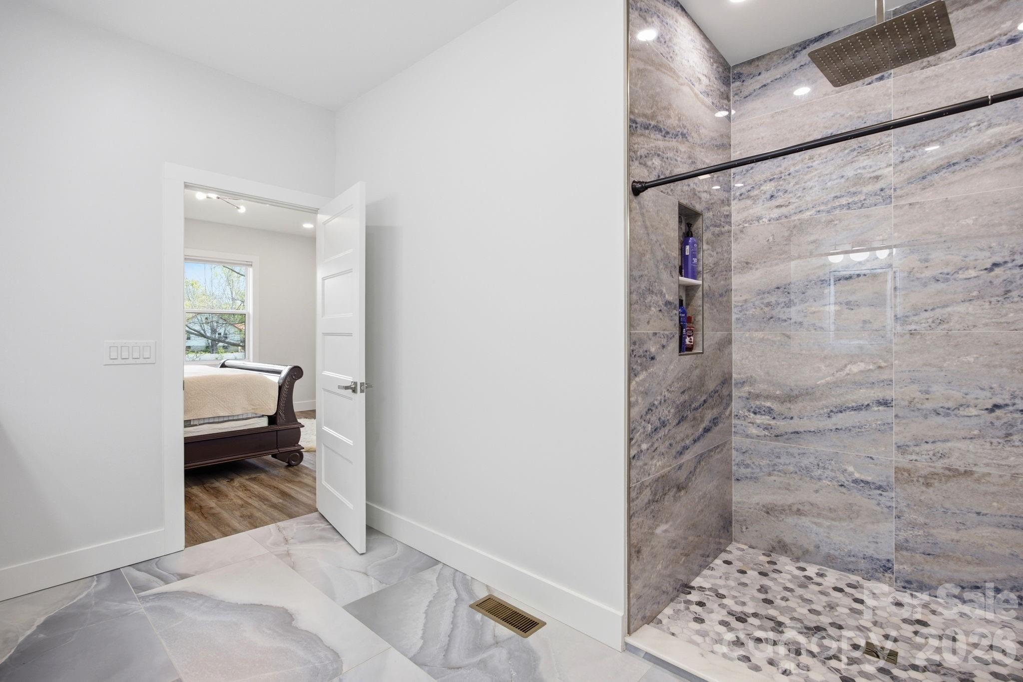 30 1st Street Canton, NC 28716 - Photo 18 of 39 a bathroom with a sink and a mirror