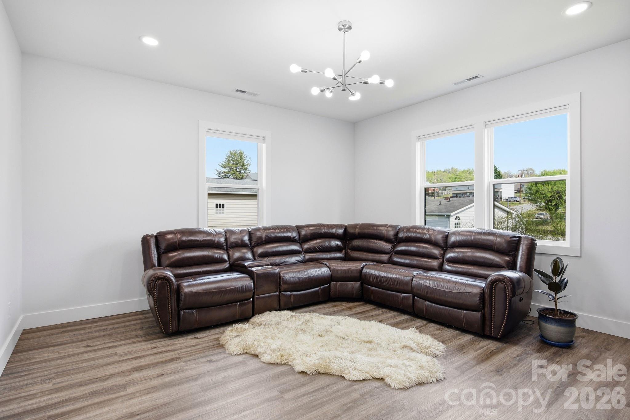 30 1st Street Canton, NC 28716 - Photo 21 of 39 a living room with furniture and a large window