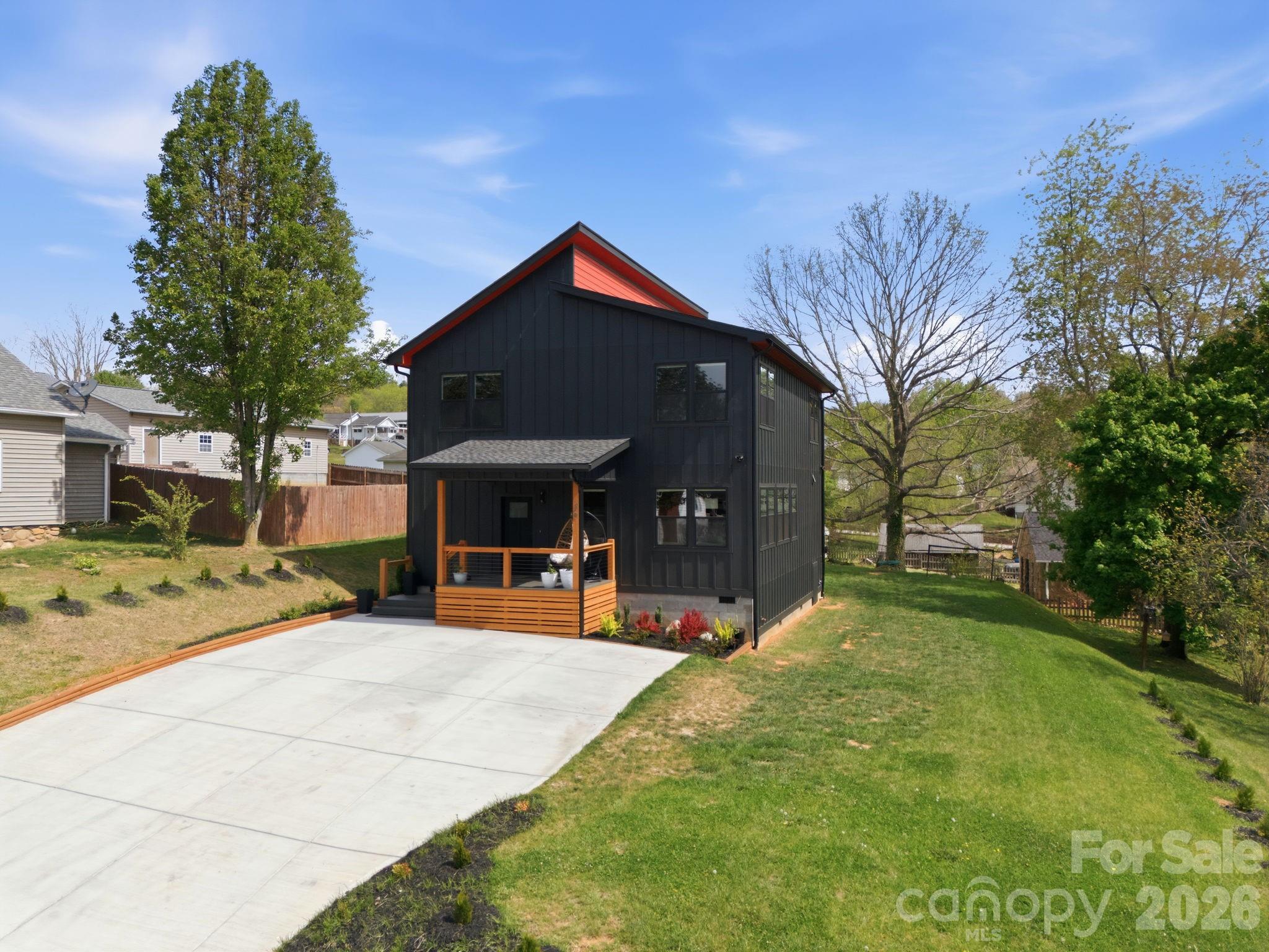 30 1st Street Canton, NC 28716 - Photo 3 of 39 a view of a backyard with a sitting area