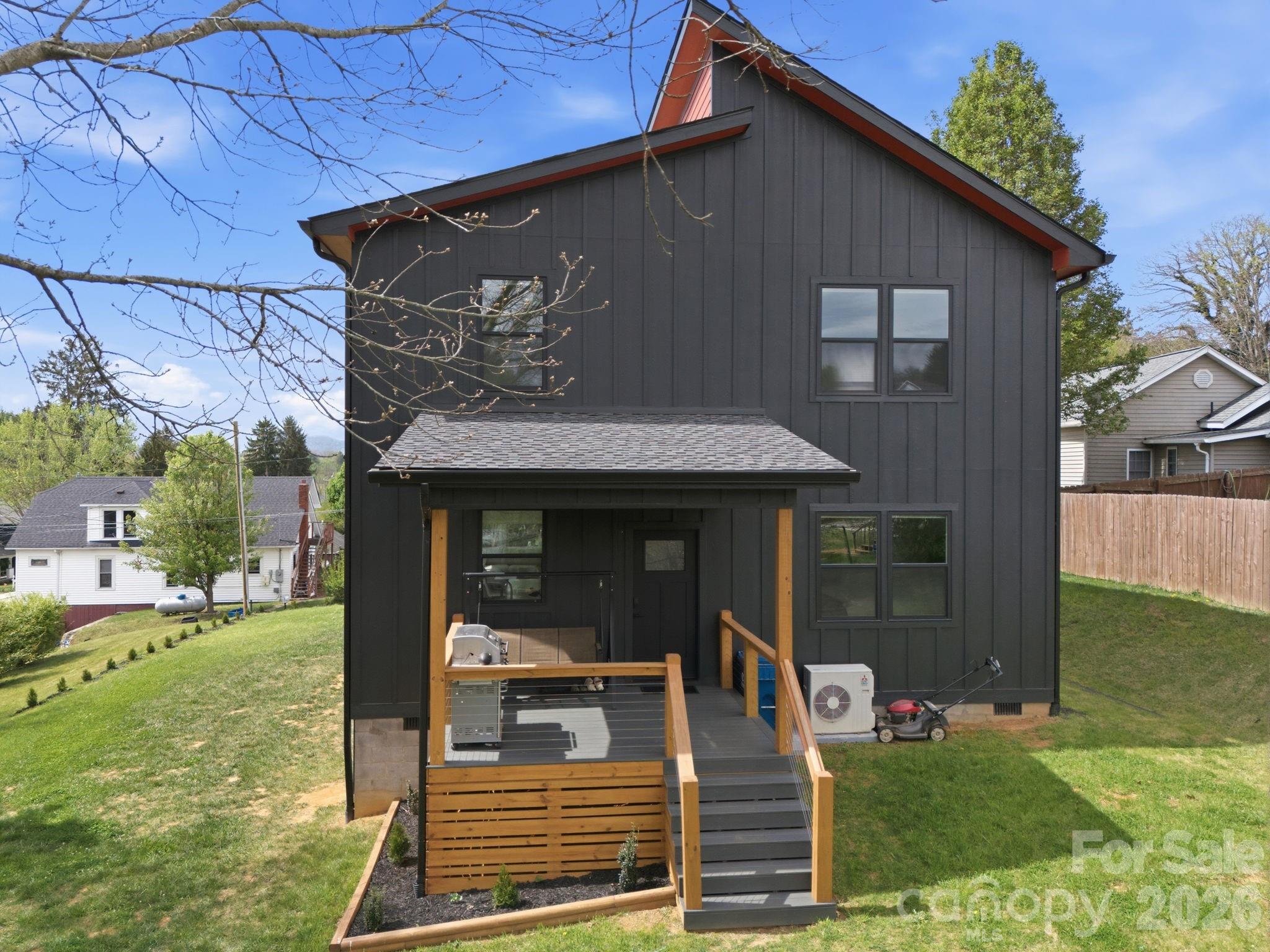 30 1st Street Canton, NC 28716 - Photo 35 of 39 a front view of a house with garden