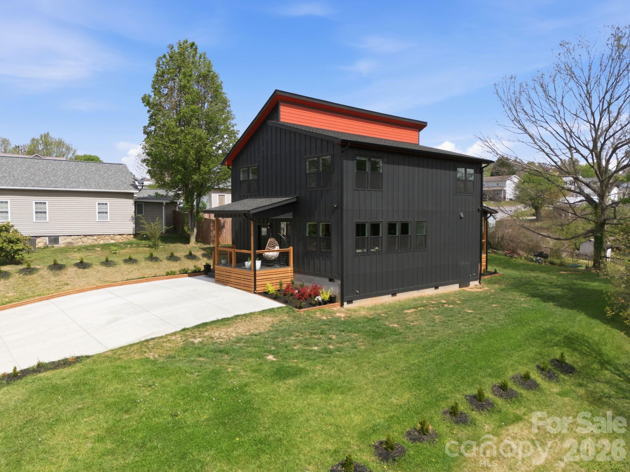 30 1st Street Canton, NC 28716 - Photo 36 of 39 a view of a house with a yard and tree
