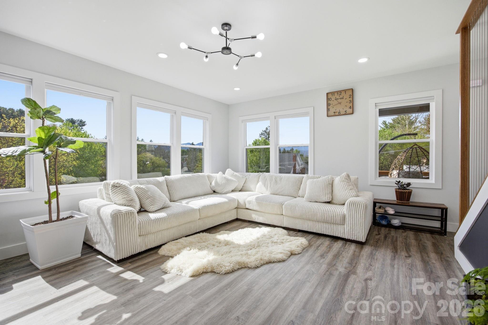 30 1st Street Canton, NC 28716 - Photo 5 of 39 a living room with furniture and a large window