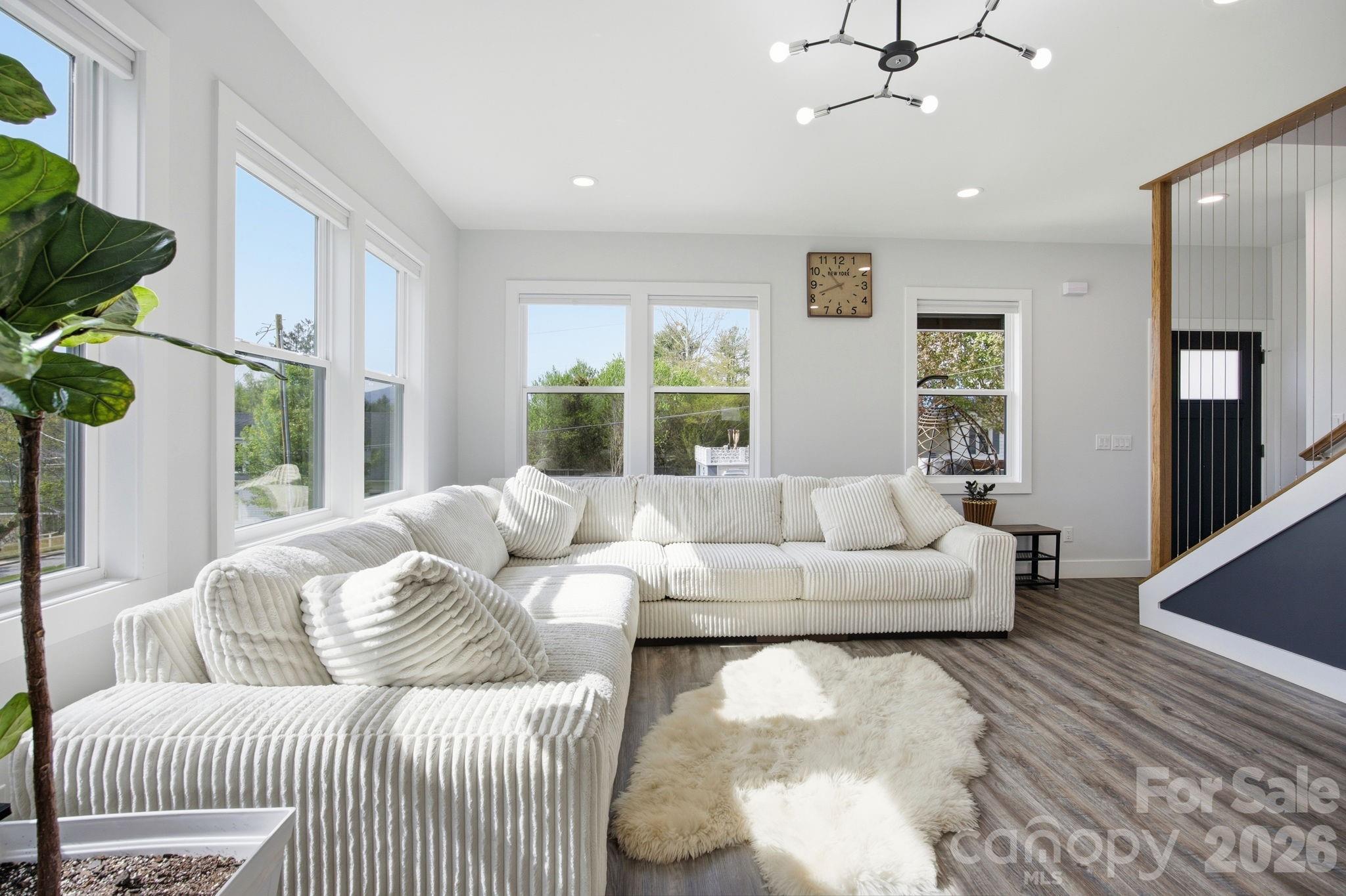 30 1st Street Canton, NC 28716 - Photo 6 of 39 a living room with furniture and a large window