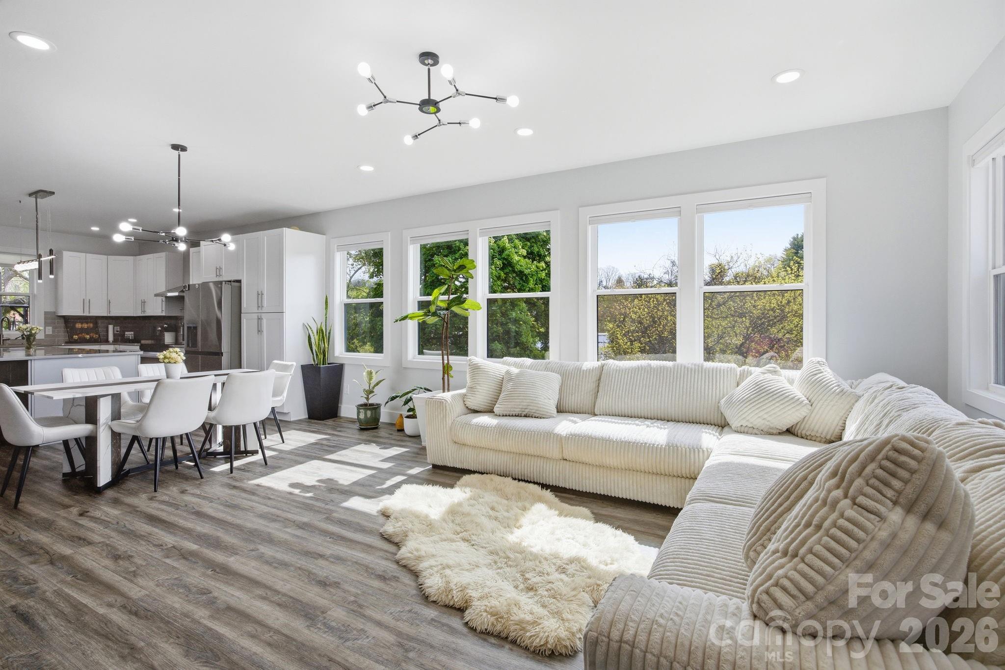 30 1st Street Canton, NC 28716 - Photo 7 of 39 a living room with furniture and a large window