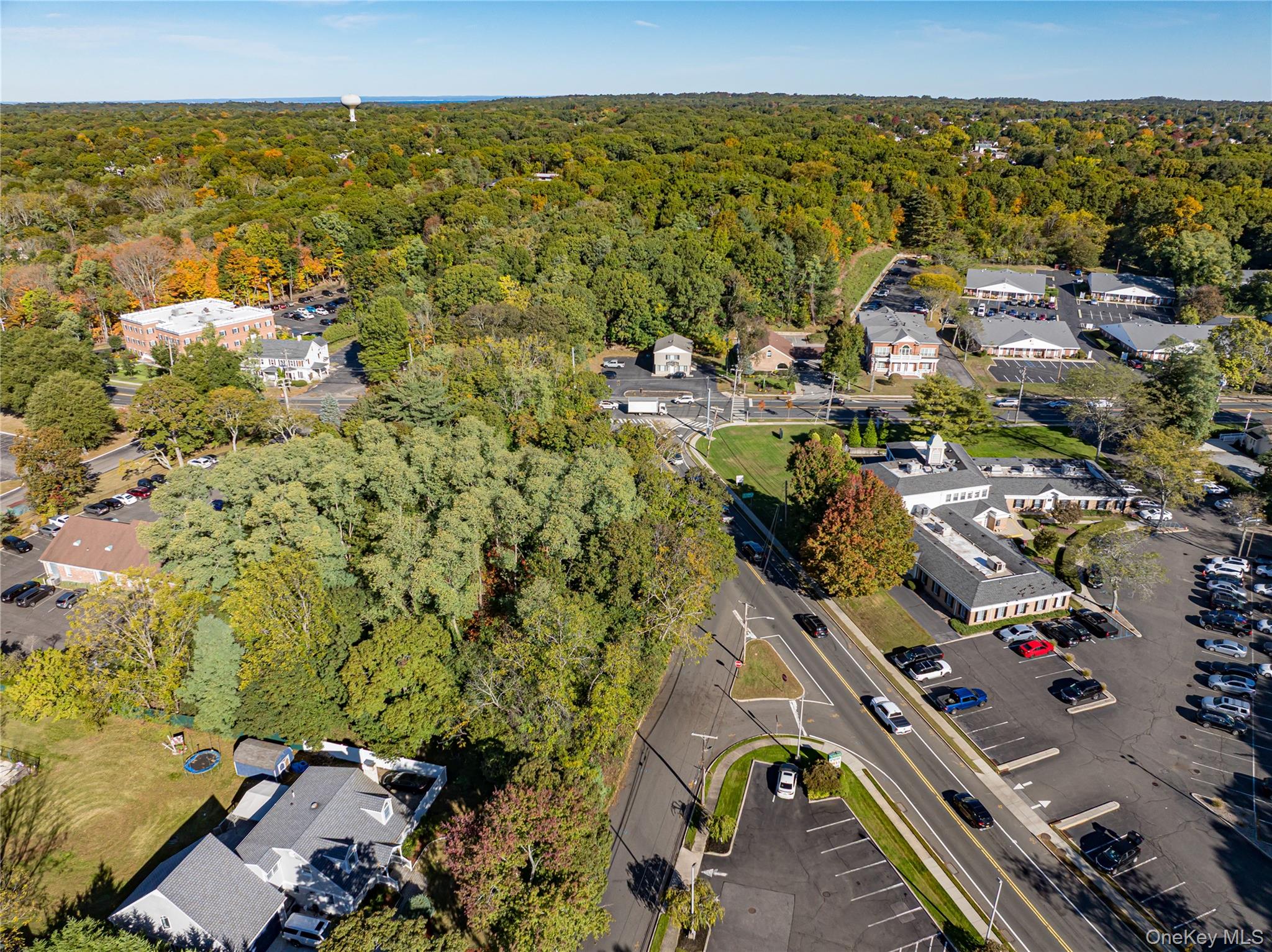 Middle Country Road Smithtown, NY 11780 - Photo 18 of 23 an aerial view of residential houses with outdoor space