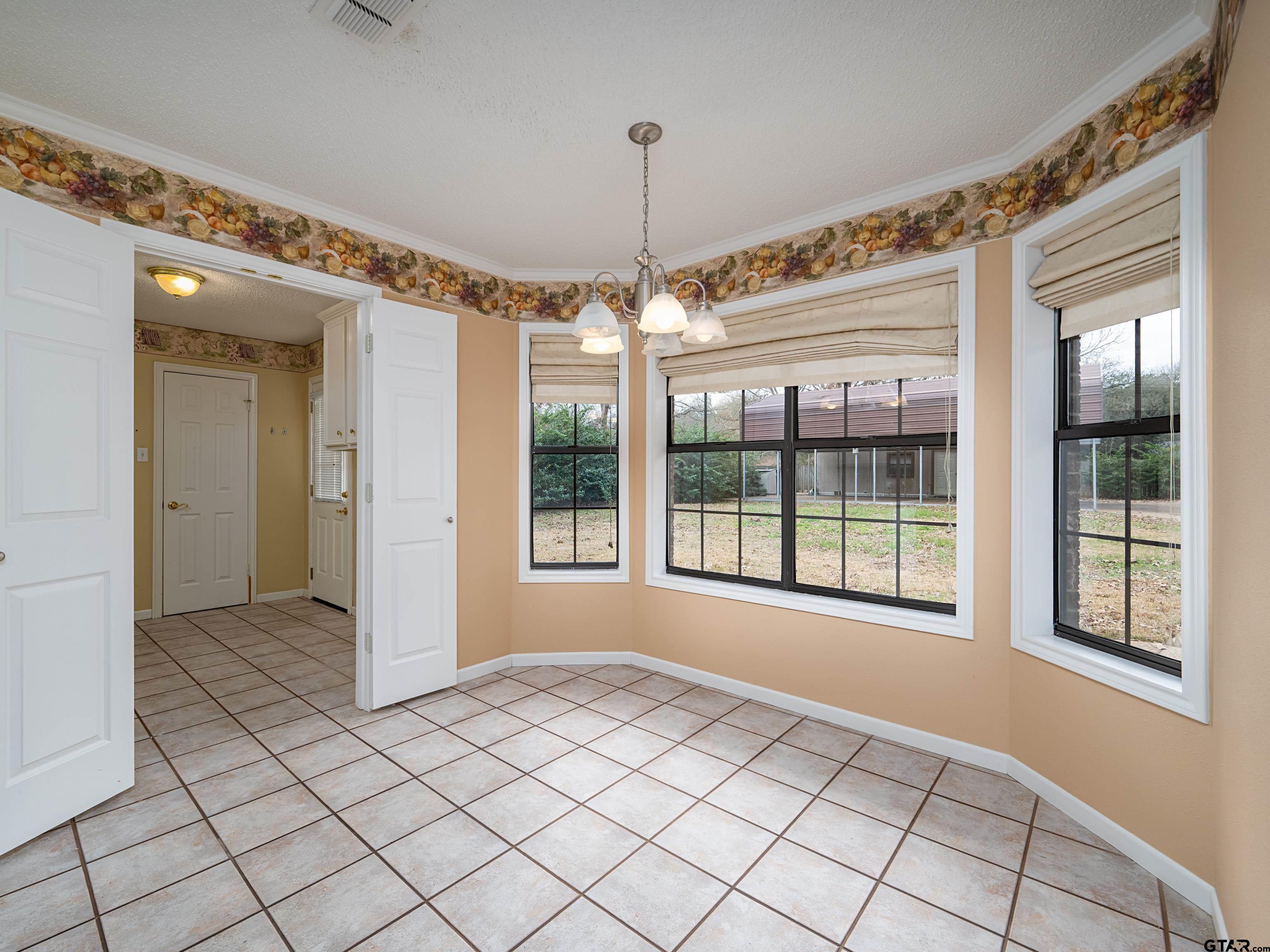 17984 Briarcrest Flint, TX 75762 - Photo 12 of 29 a view of an empty room with a window