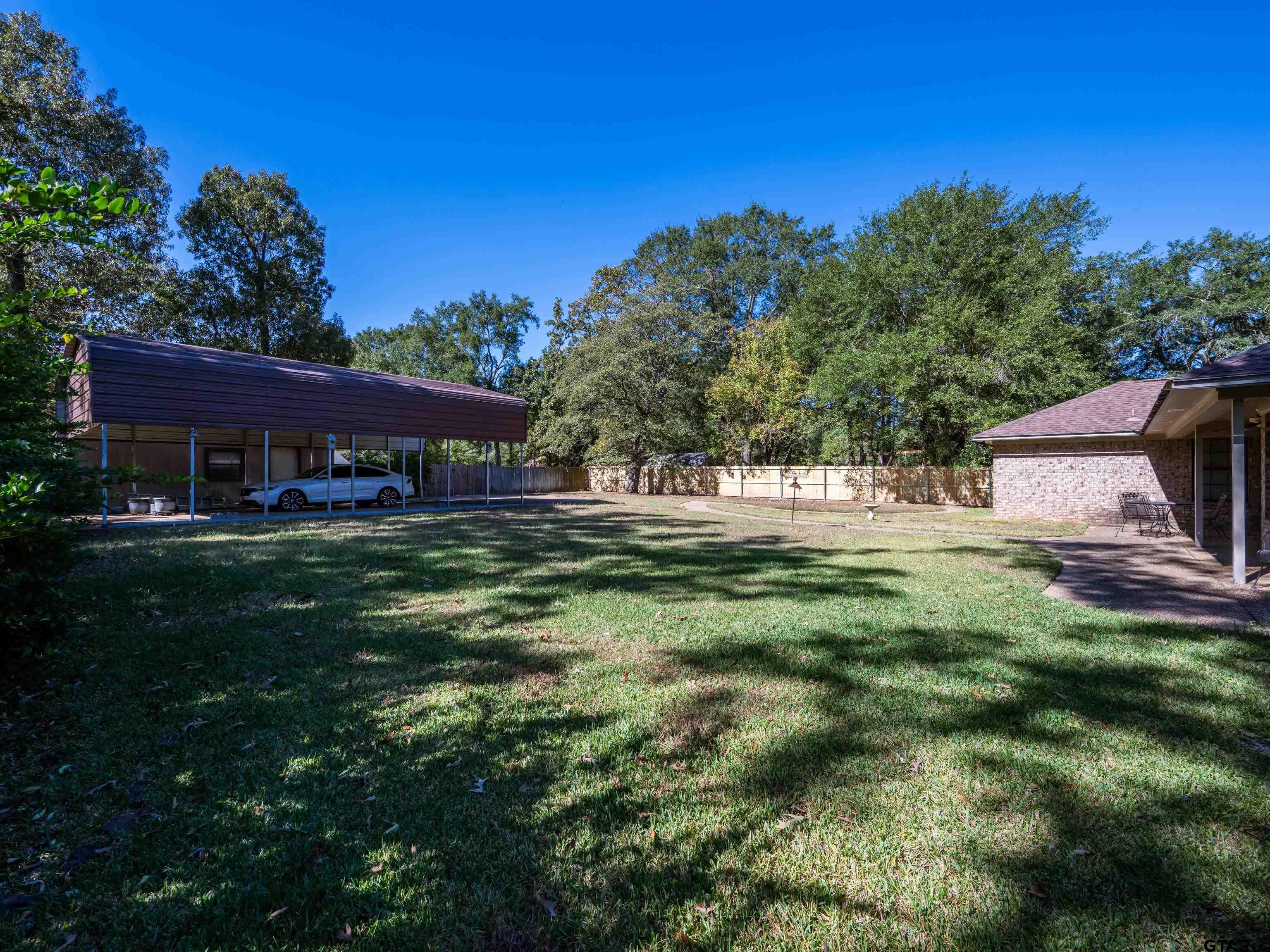 17984 Briarcrest Flint, TX 75762 - Photo 26 of 29 a view of a house with a yard