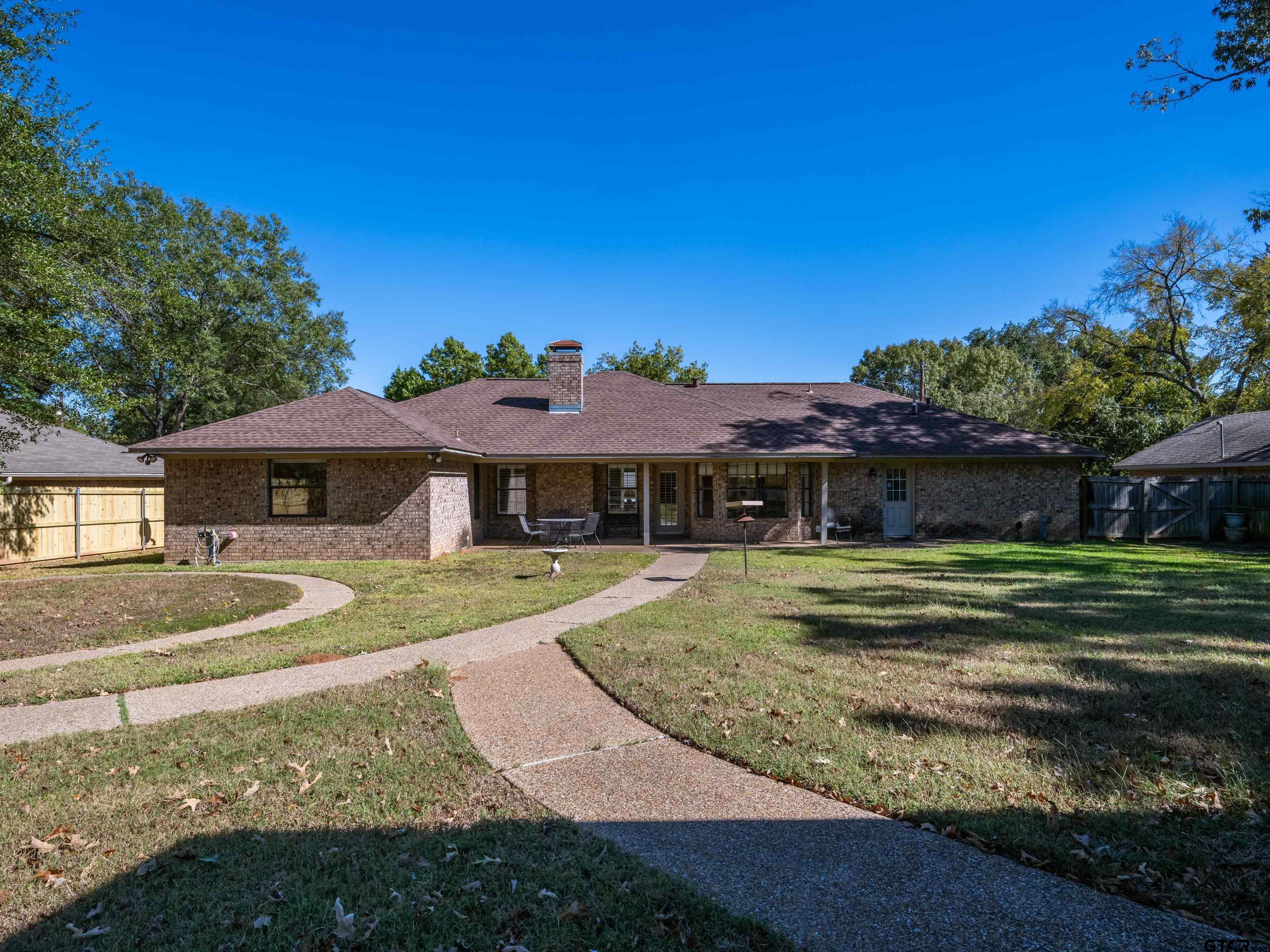 17984 Briarcrest Flint, TX 75762 - Photo 28 of 29 a view of a house with a yard