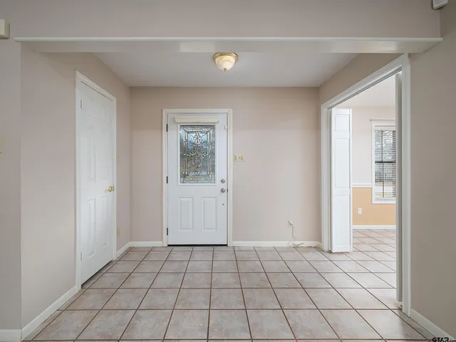 a view of an empty room and window