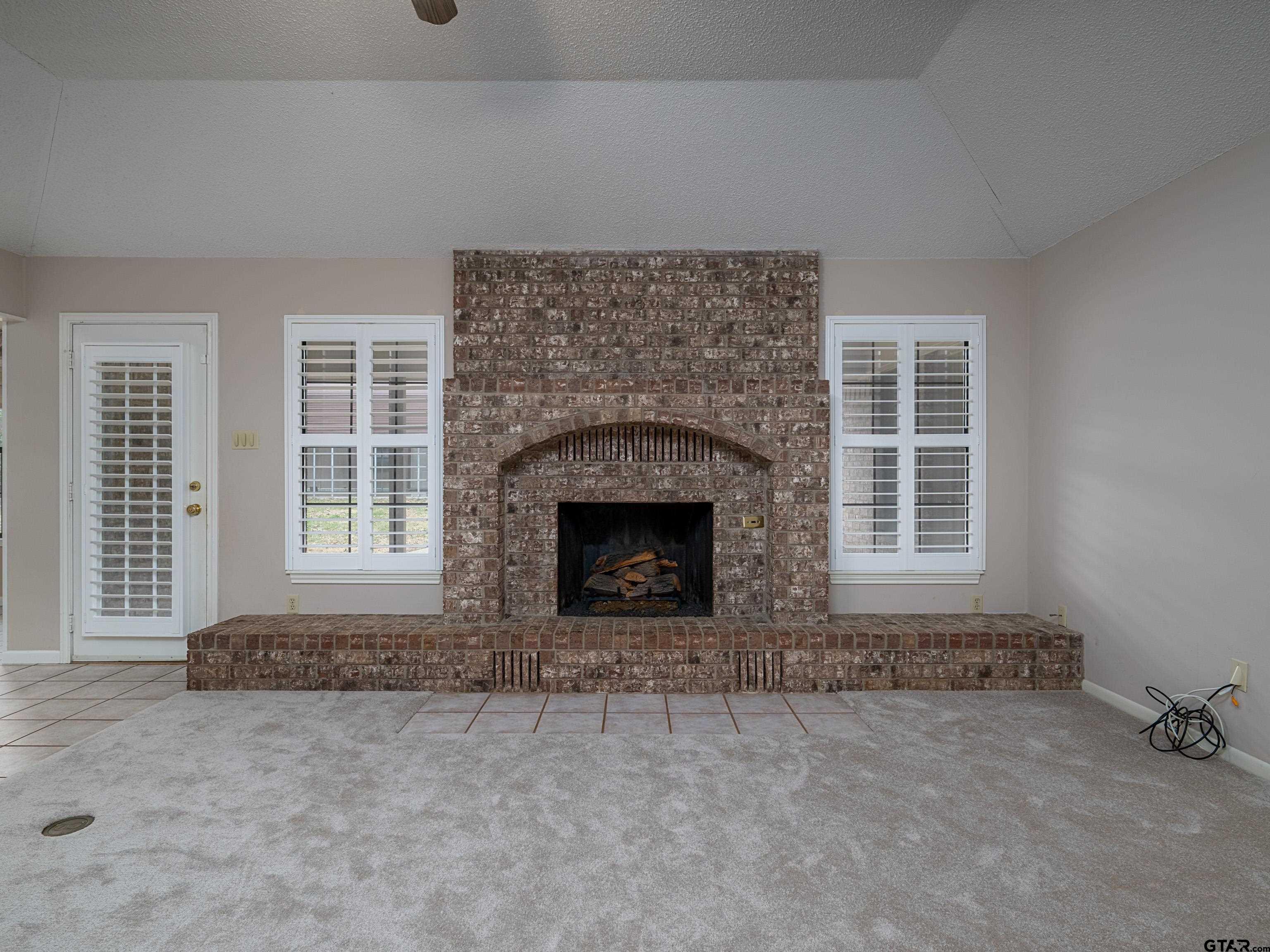 17984 Briarcrest Flint, TX 75762 - Photo 6 of 29 an empty room with windows