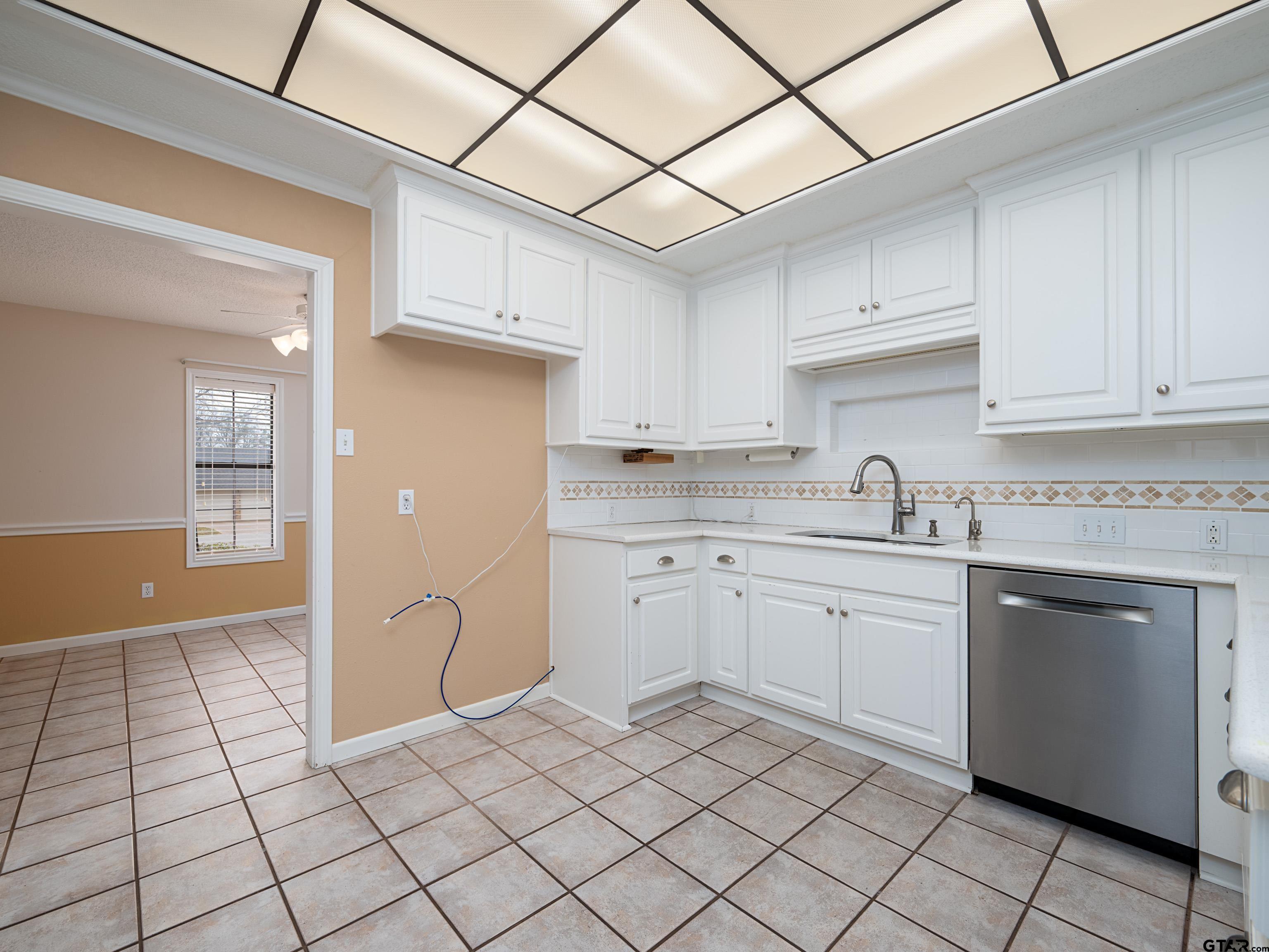 17984 Briarcrest Flint, TX 75762 - Photo 9 of 29 a kitchen with cabinets and appliances