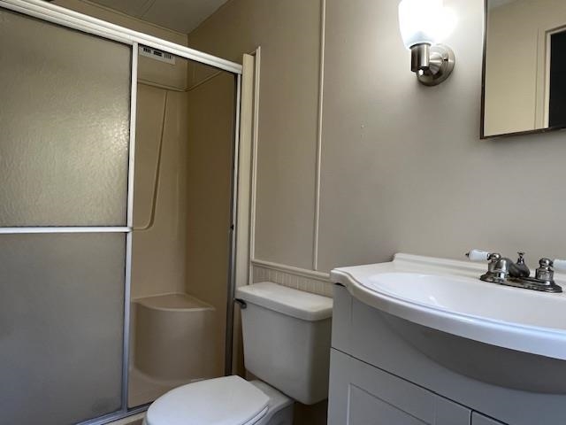 223 Yarbrough Road St. Augustine, FL 32095 - Photo 12 of 16 a bathroom with a sink a toilet and shower
