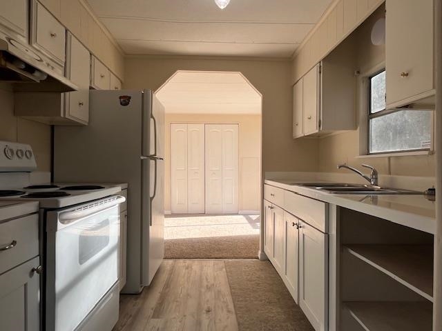 223 Yarbrough Road St. Augustine, FL 32095 - Photo 8 of 16 a kitchen with stainless steel appliances granite countertop a sink and a stove top oven