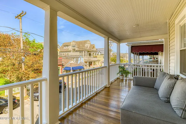 a view of a porch with furniture