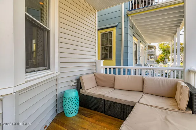a view of a house with a couches in a patio