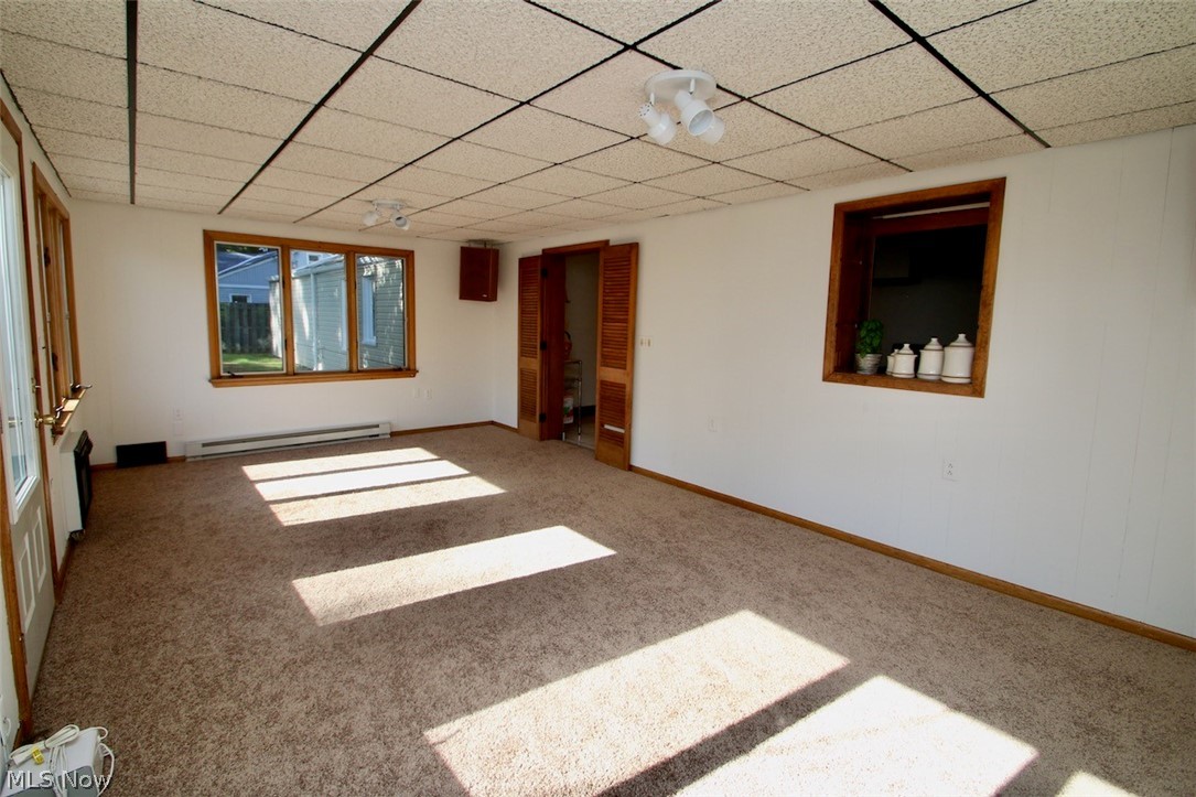 3 Nepahwin Road Timberlake, OH 44095 - Photo 5 of 22 Family room is ready for your personal touches. Freshly painted with new carpeting. Windows give you a great view of the back yard or enjoy Lake Erie breezes.
