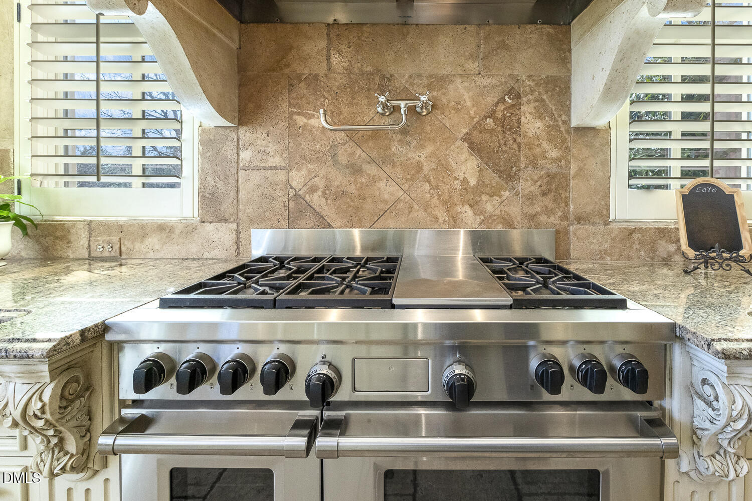 7505 New Sharon Church Road Rougemont, NC 27572 - Photo 18 of 99 a stove top oven sitting inside of a kitchen